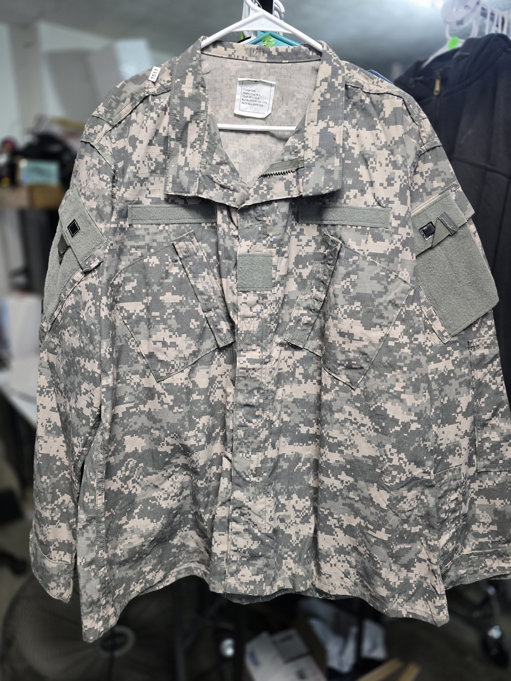 U.S. Army ACU Combat Uniform Coat featuring a Universal Camouflage Pattern (UCP)